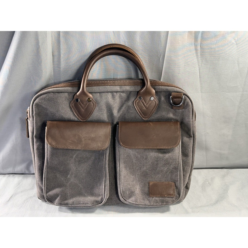 Renwick canvas briefcase featuring genuine leather trim missing shoulder strap
